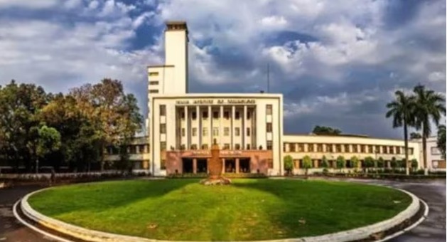 IIT Kharagpur main building with students walking, symbolizing academic and emotional support environment